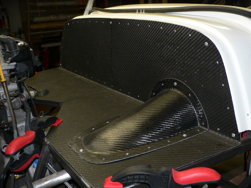 Homemade carbon fiber panels ahead of the scuttle.